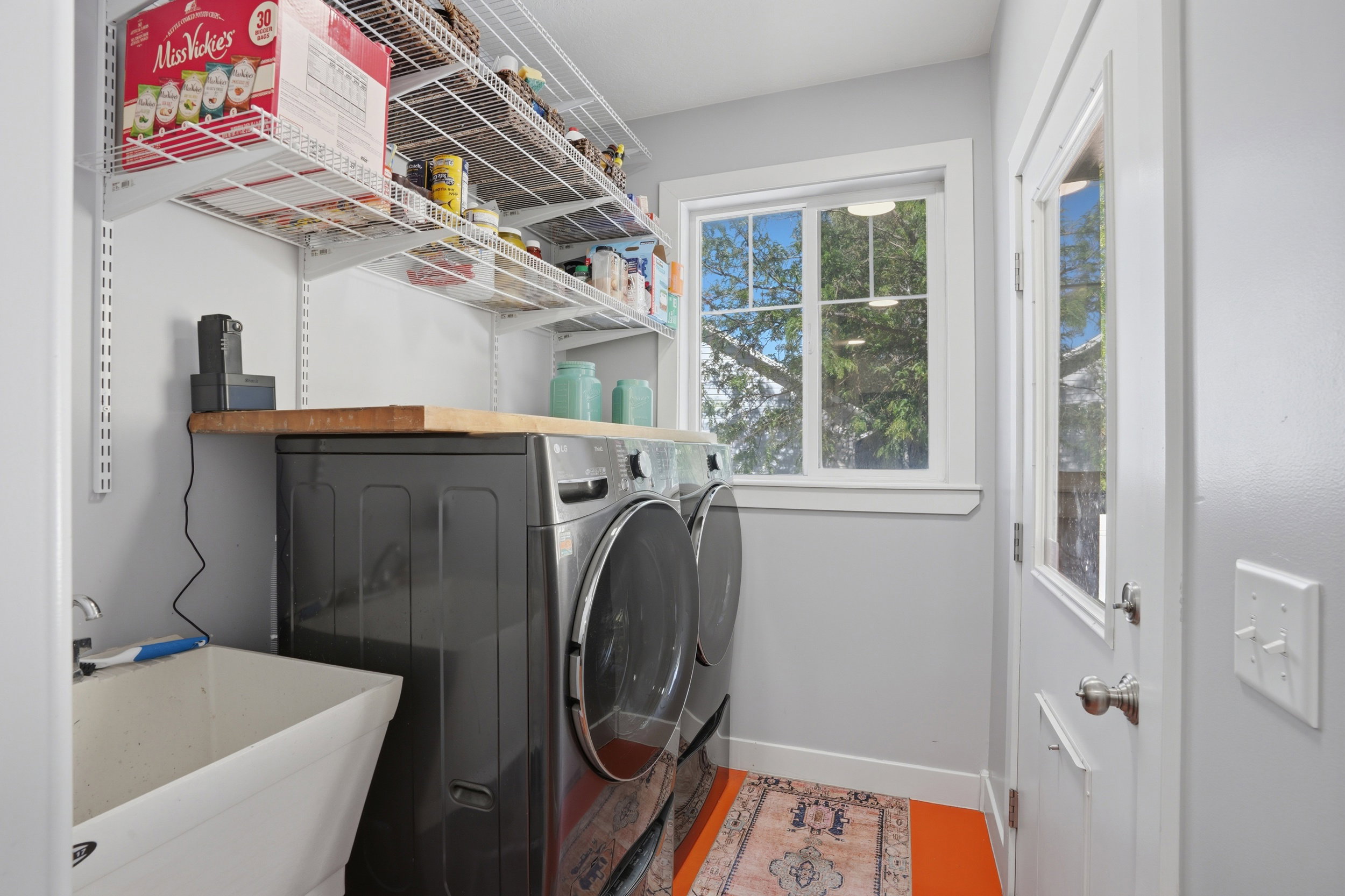 Oversized washer & dryer included (3 yrs old) with featured wash sink