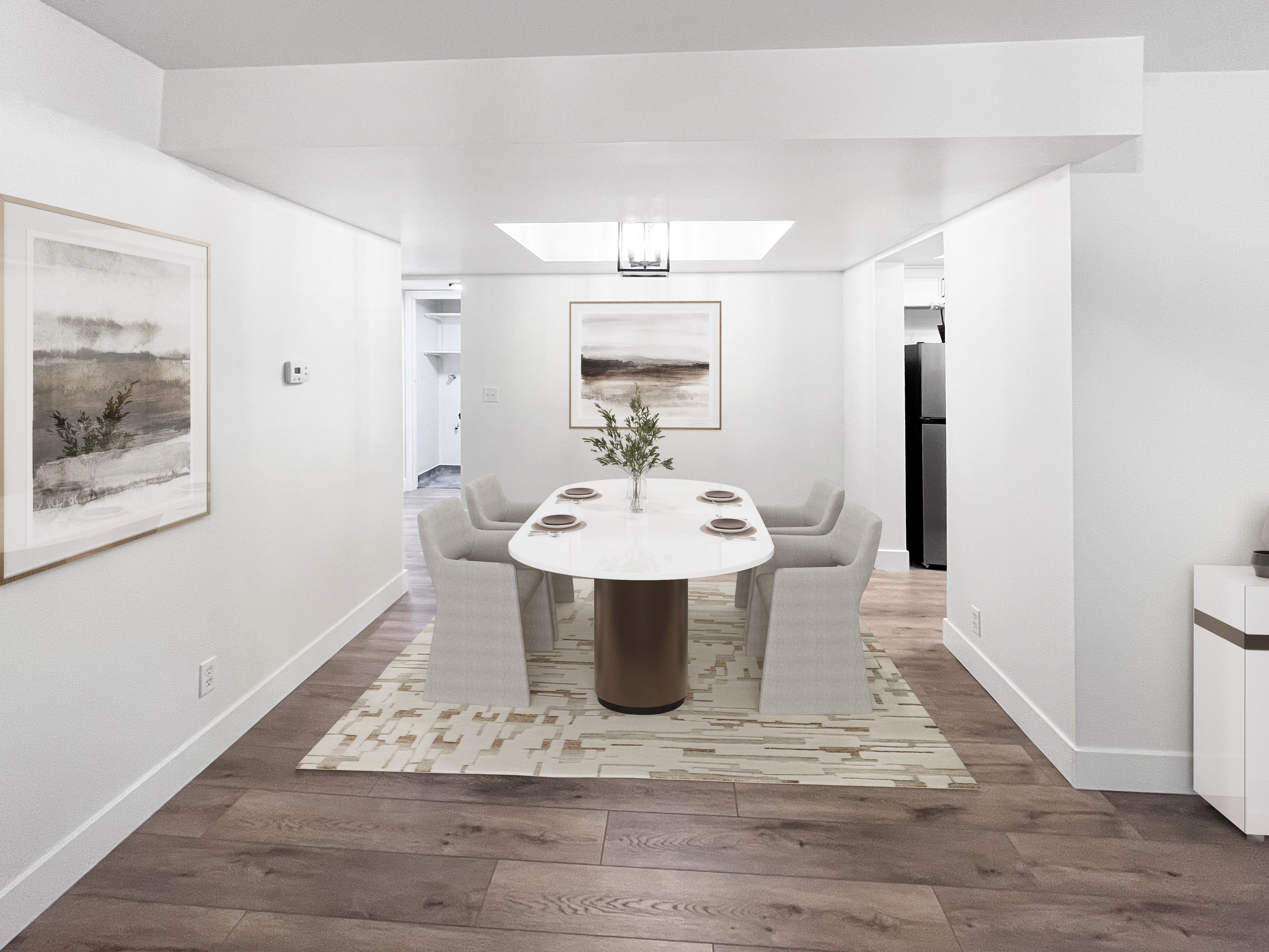 VIRTUALLY STAGED-Dining room featuring fresh wood style floors and artistic ceiling