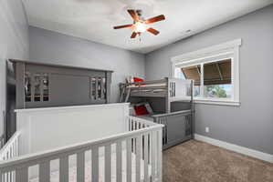 Room featuring light gray painted walls and brown carpet flooring