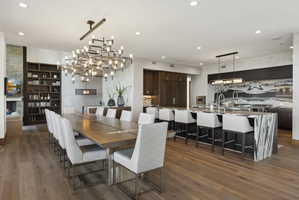 Open-concept living space with wood-finish flooring