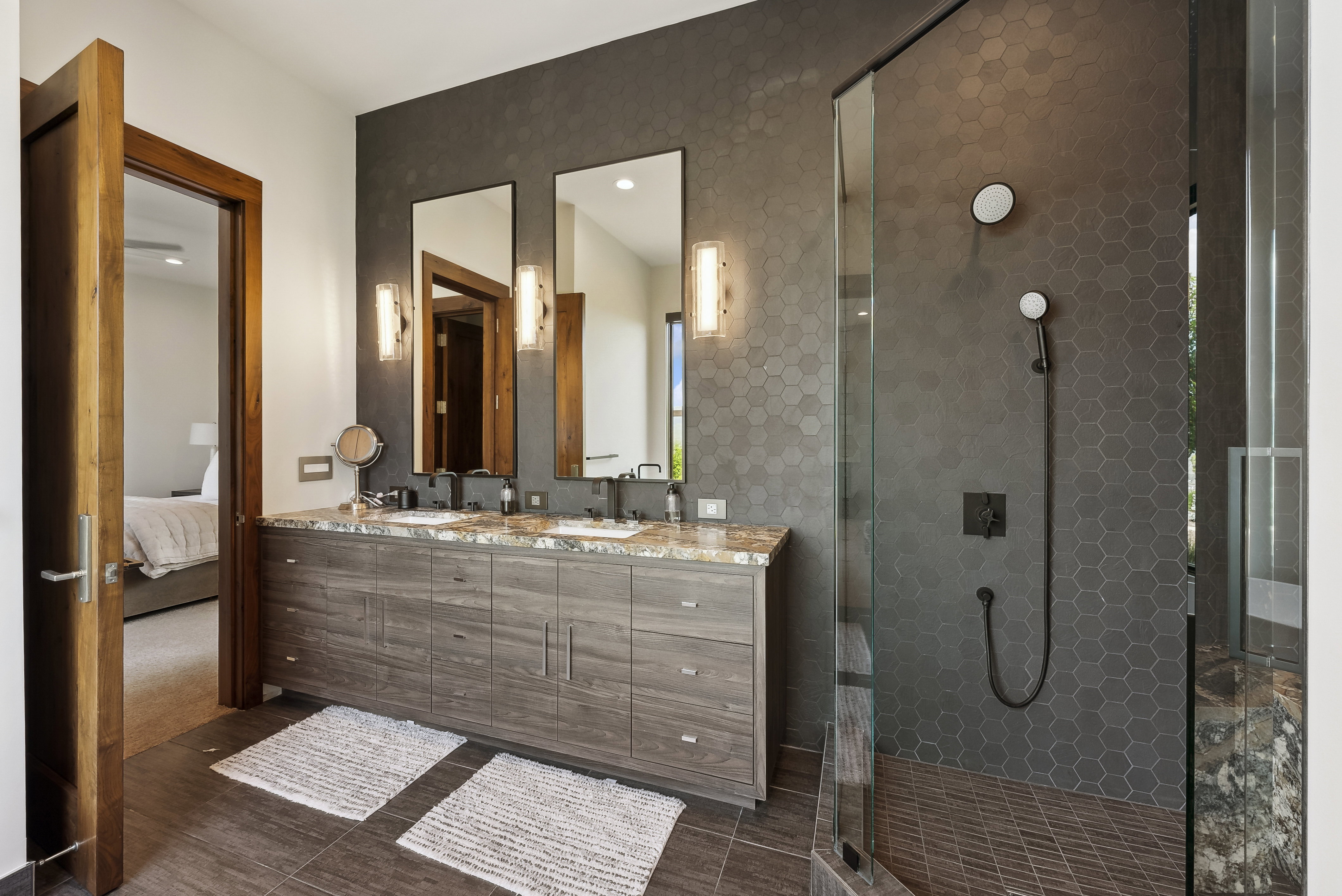 Dual vanity with stone countertop and integrated sinks