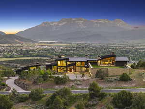 Expansive modern residence with a prominent mountain backdrop