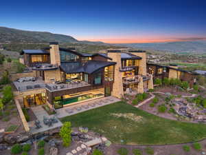 Modern architectural design featuring stone and wood siding