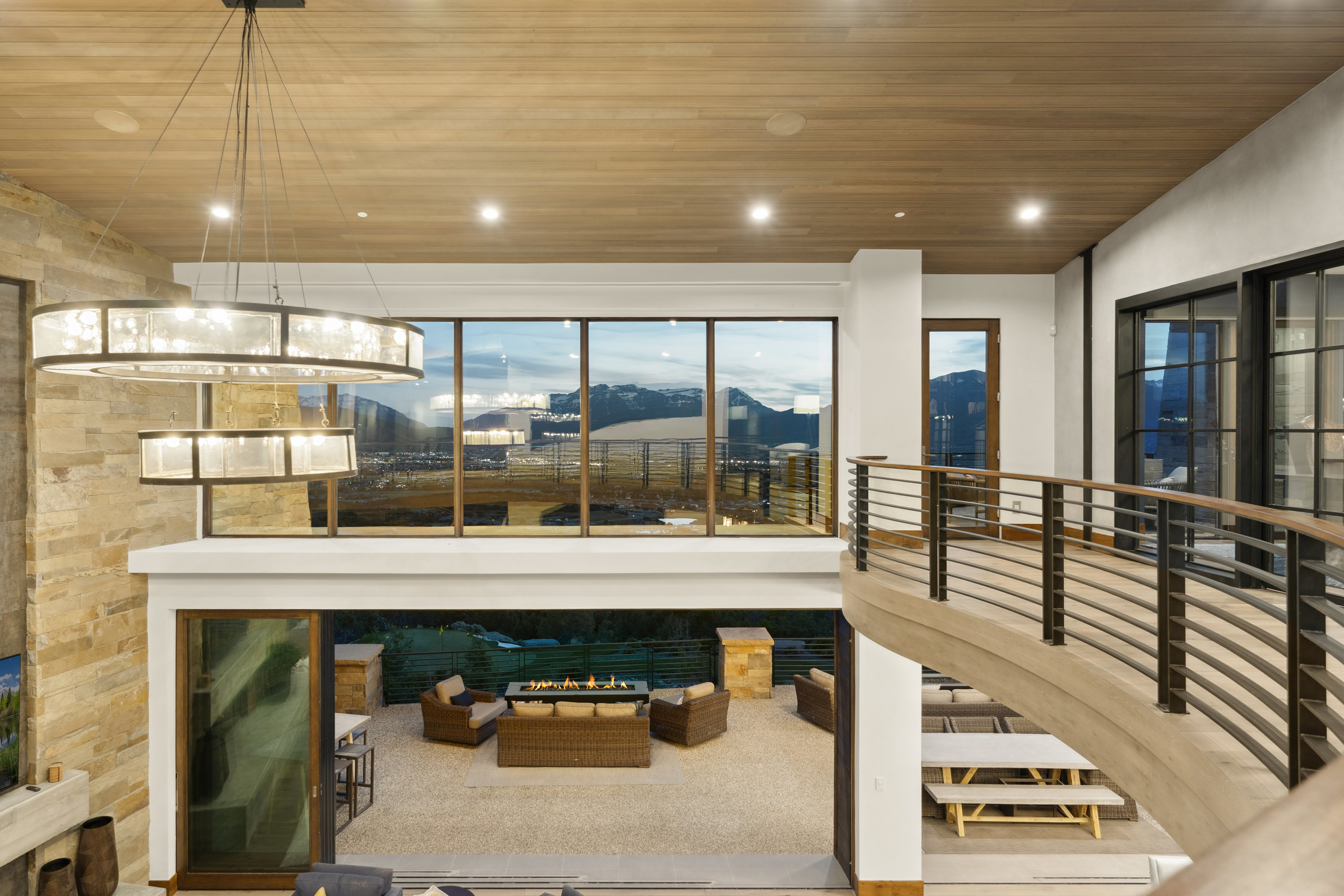 Soaring ceilings with wood-finish panels and recessed lighting