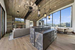 Vaulted wood-paneled ceiling with exposed beams