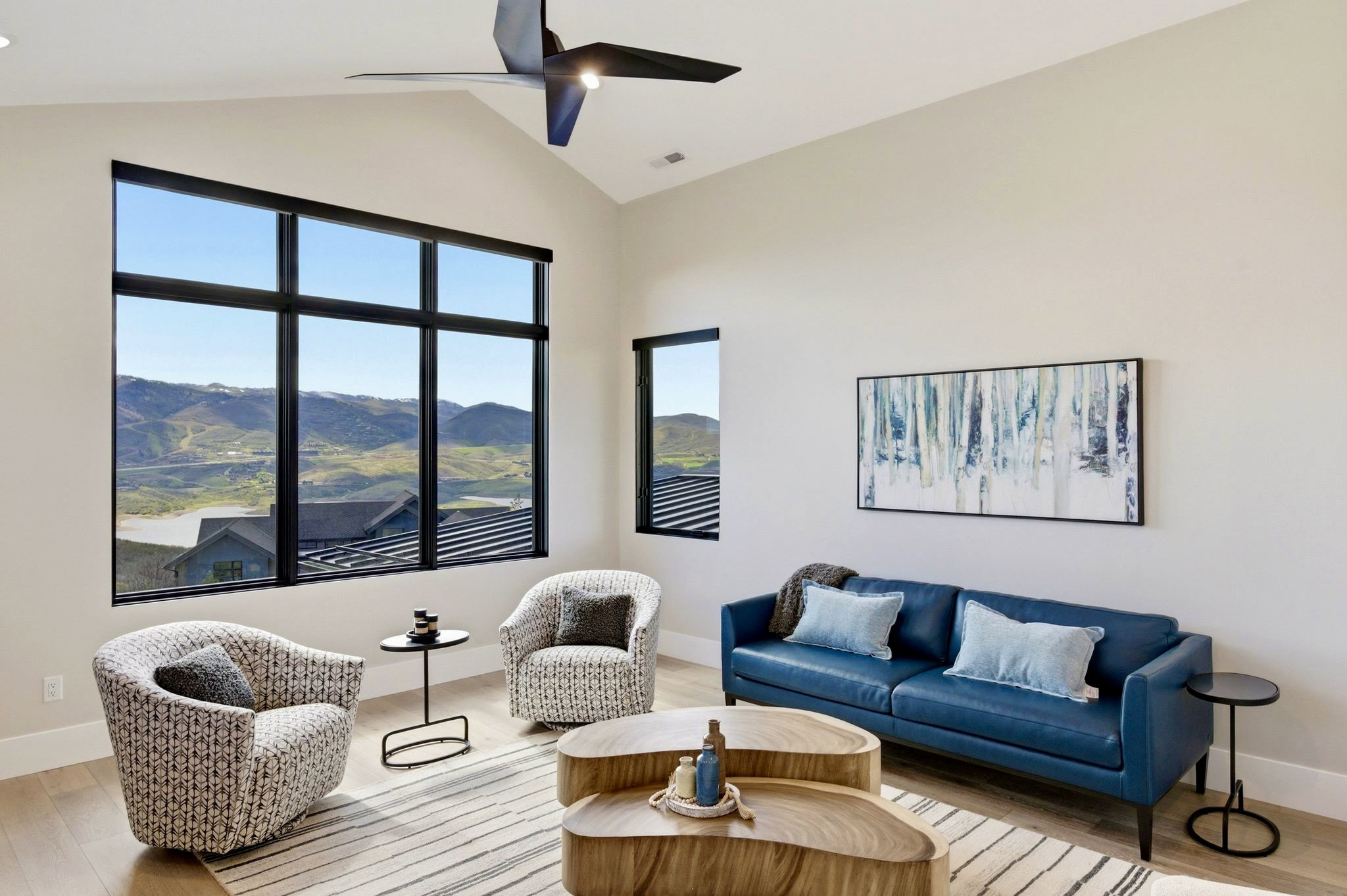 Expansive picture windows showcasing mountain scenery