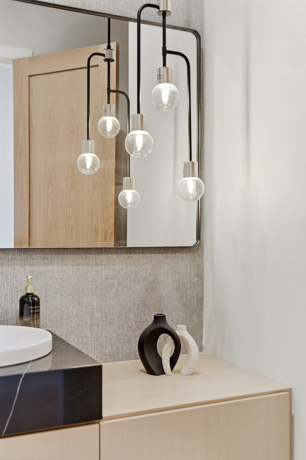Contemporary vanity lighting with multiple clear globe bulbs