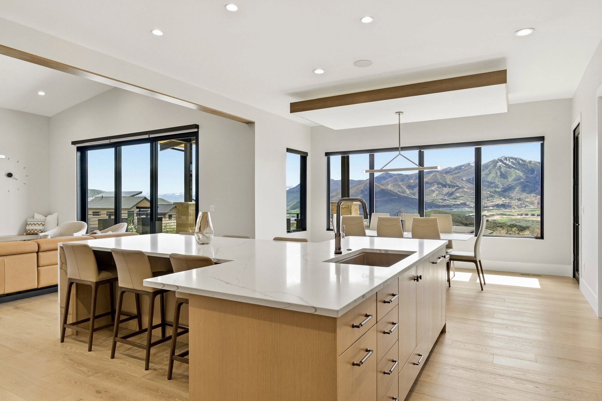 Gourmet kitchen island with a quartz countertop and integrated sink