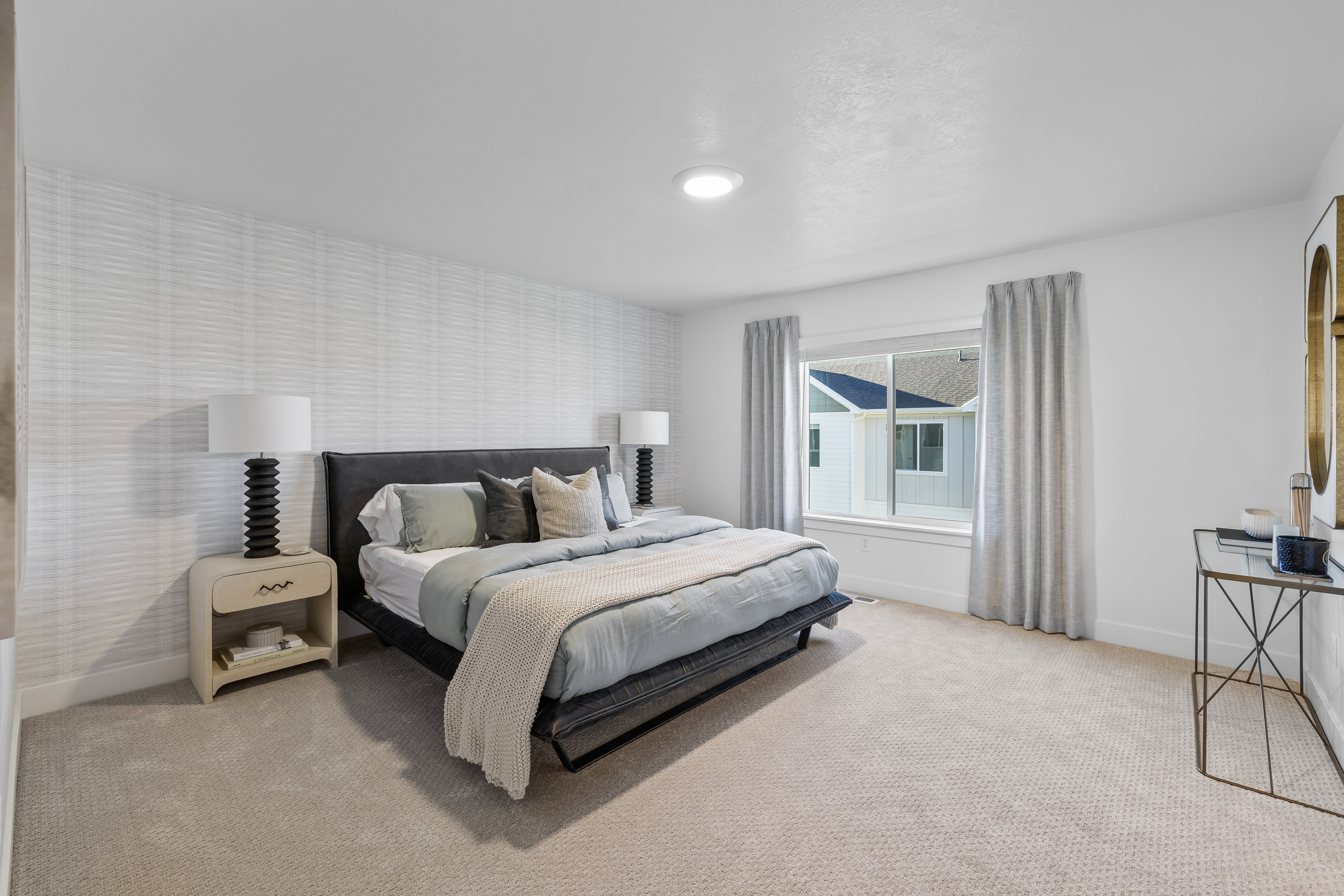Photos shown are of the Model Home featuring the same floorplan. Finishes and selections may vary from the actual home.