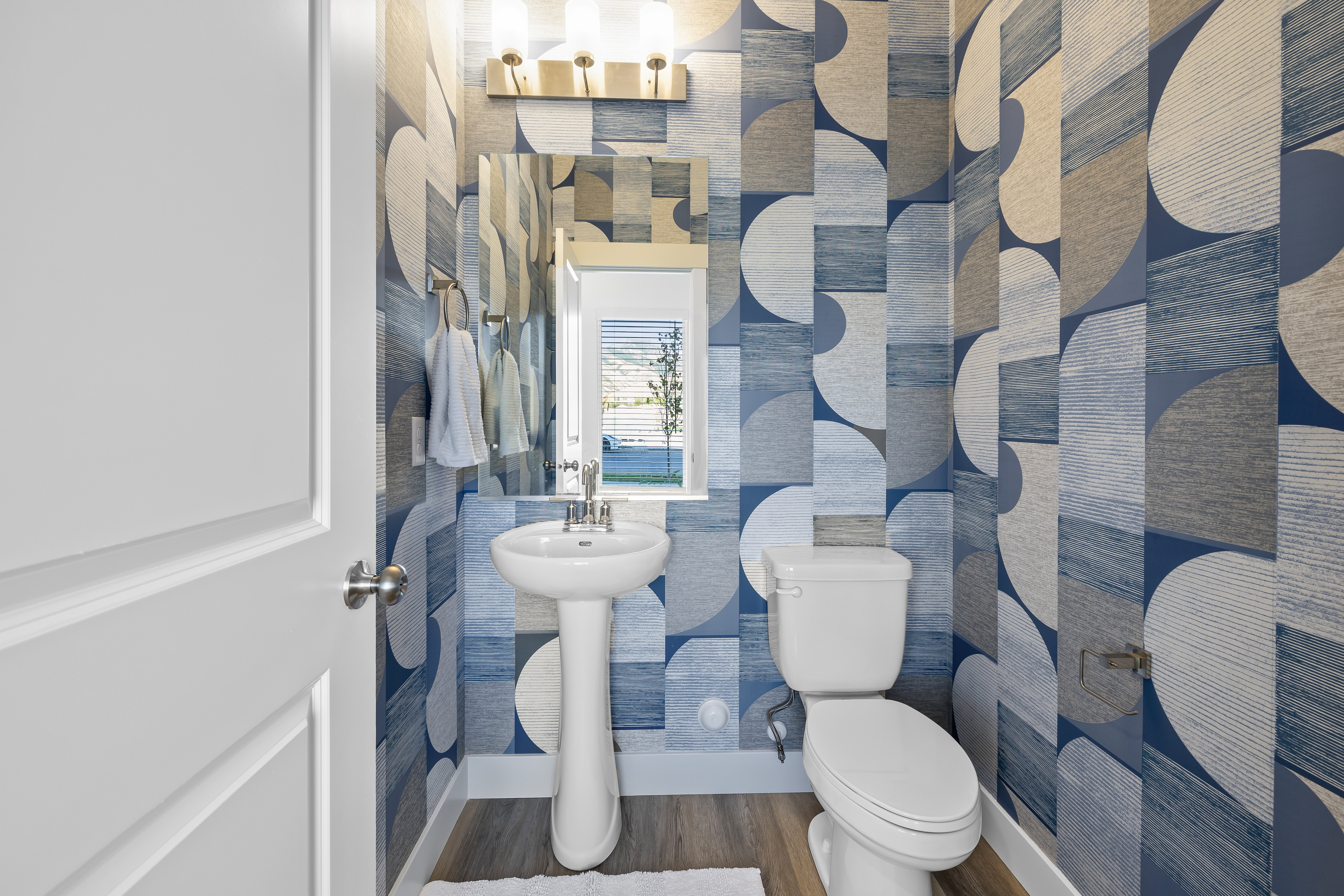 Photos shown are of the Model Home featuring the same floorplan. Finishes and selections may vary from the actual home.