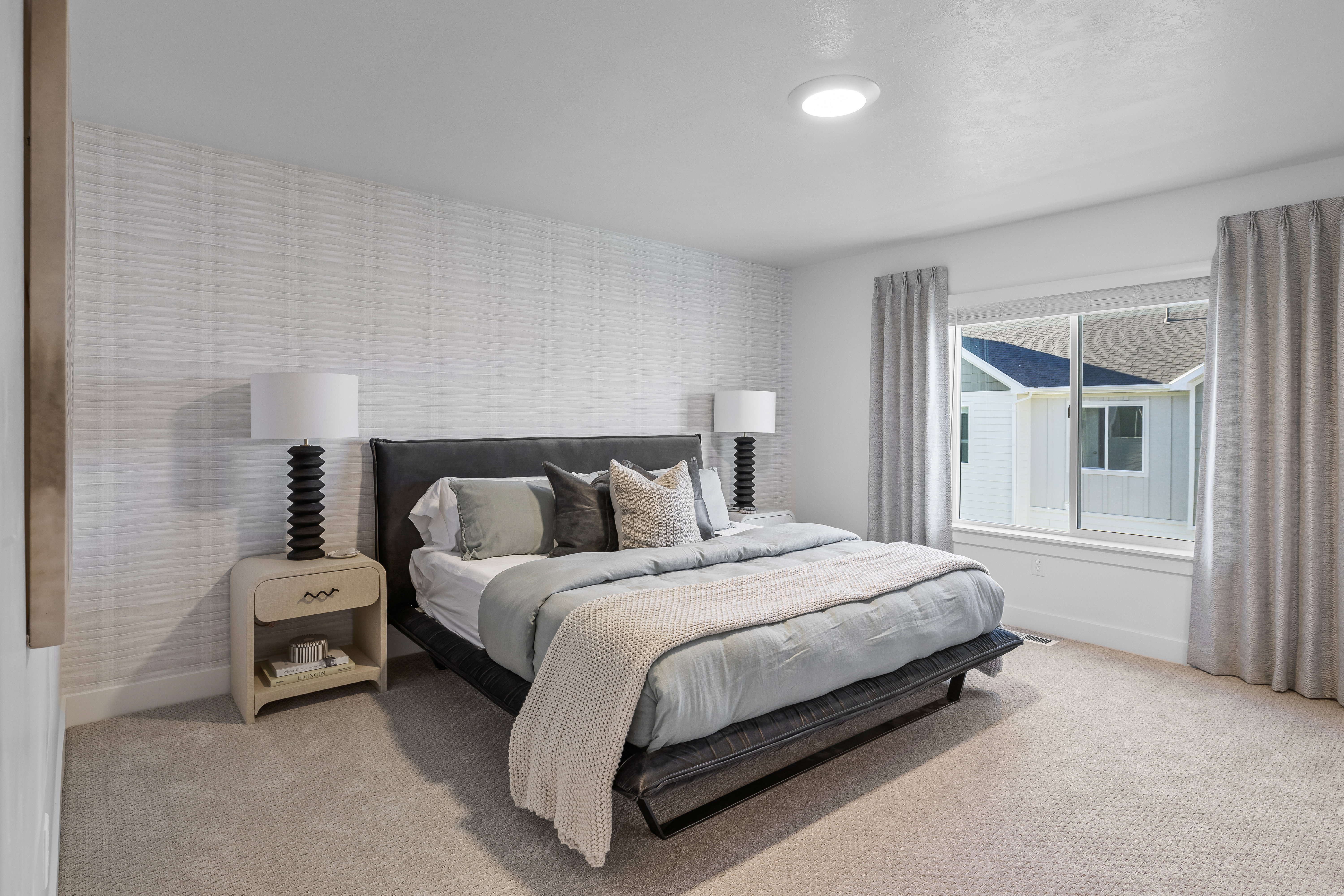 Photos shown are of the Model Home featuring the same floorplan. Finishes and selections may vary from the actual home.