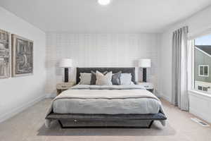 Photos shown are of the Model Home featuring the same floorplan. Finishes and selections may vary from the actual home.