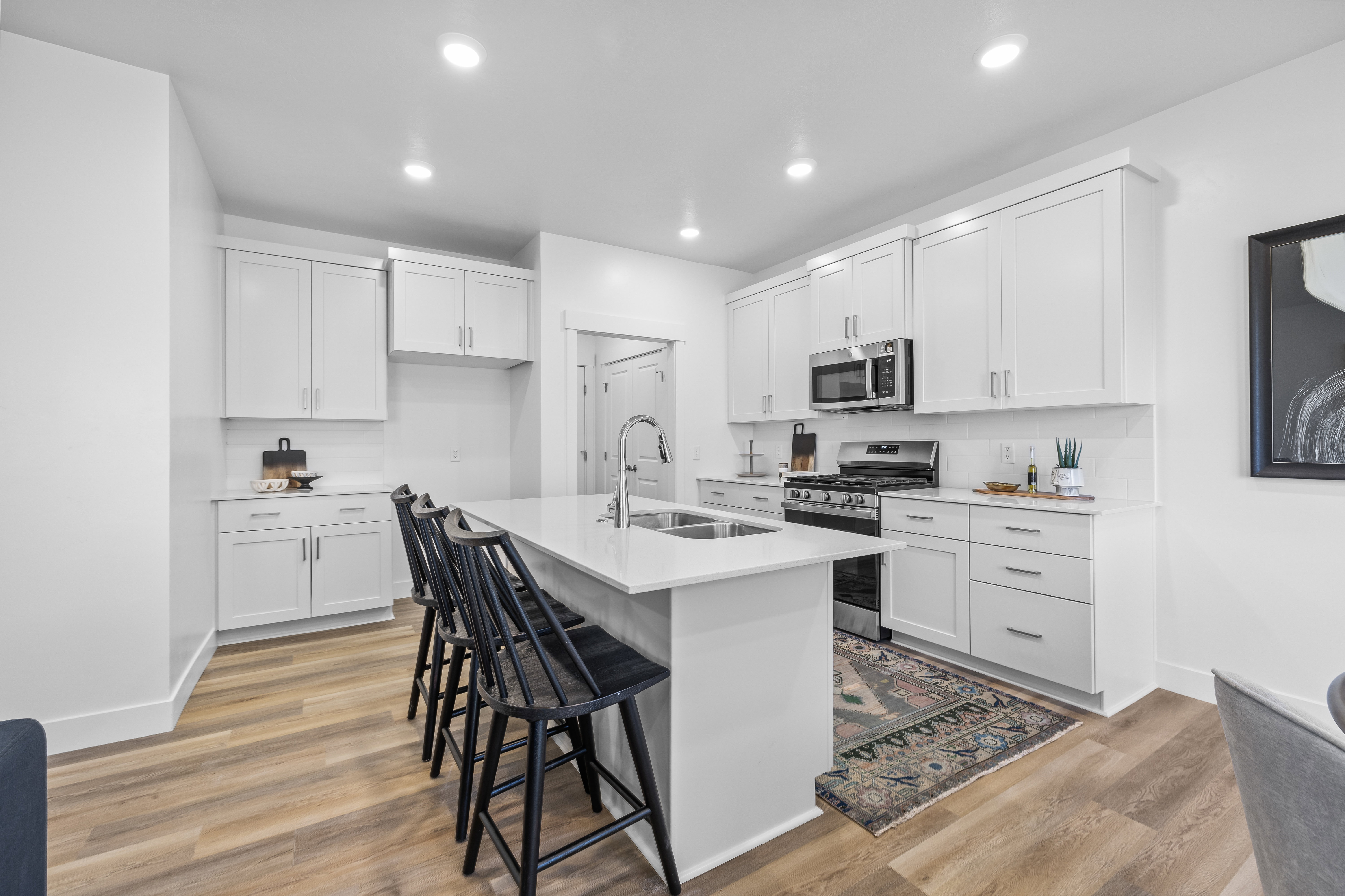 Photos shown are of the Model Home featuring the same floorplan. Finishes and selections may vary from the actual home.