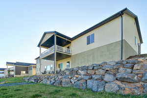 Two-tone stucco exterior with dark trim