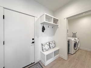 Entryway mudroom with built-in bench and storage cubbies