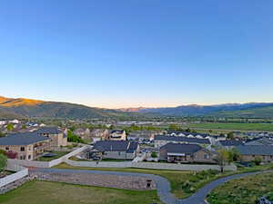 Expansive mountain backdrop with distant snow-capped peaks