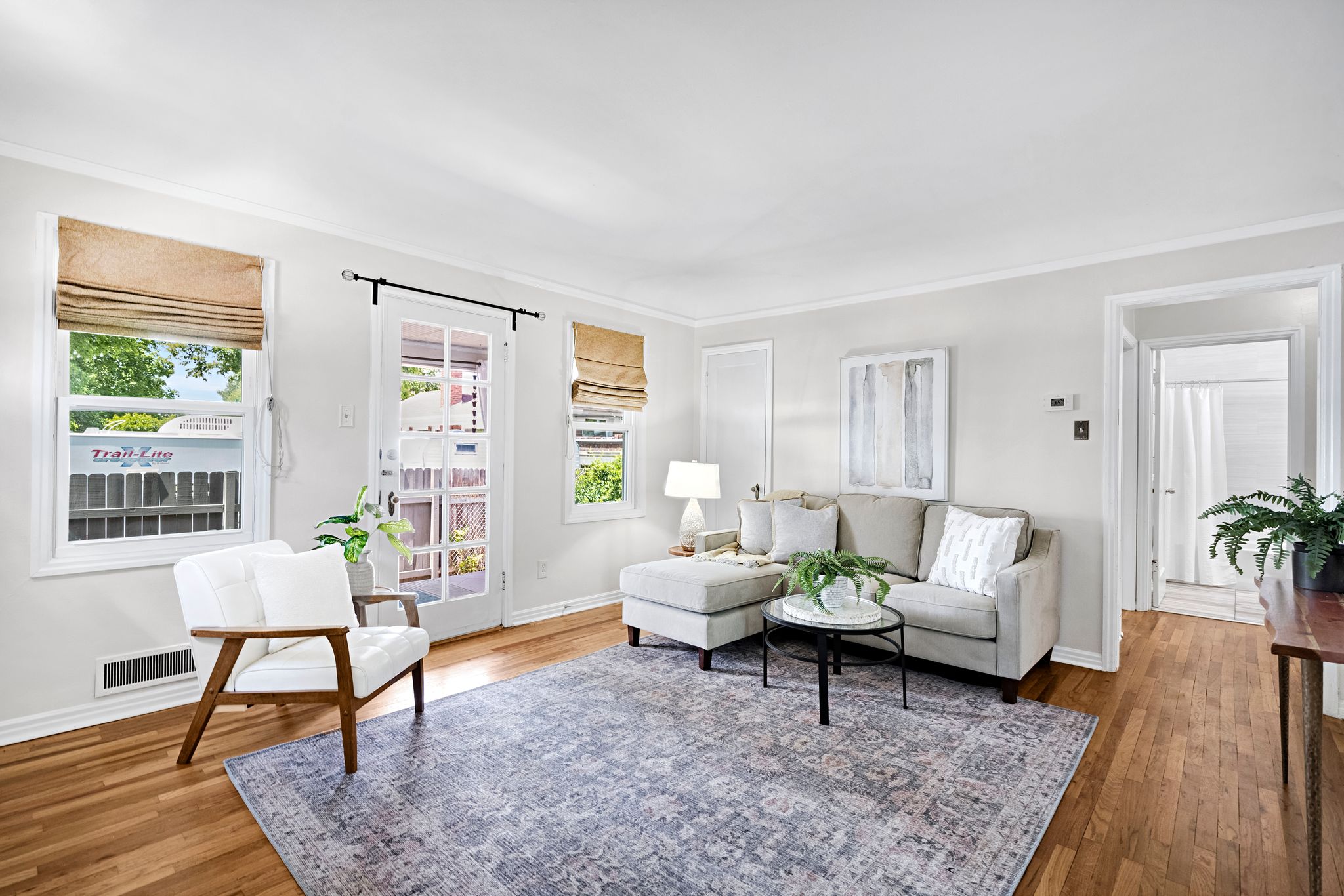Hardwood flooring throughout the living space