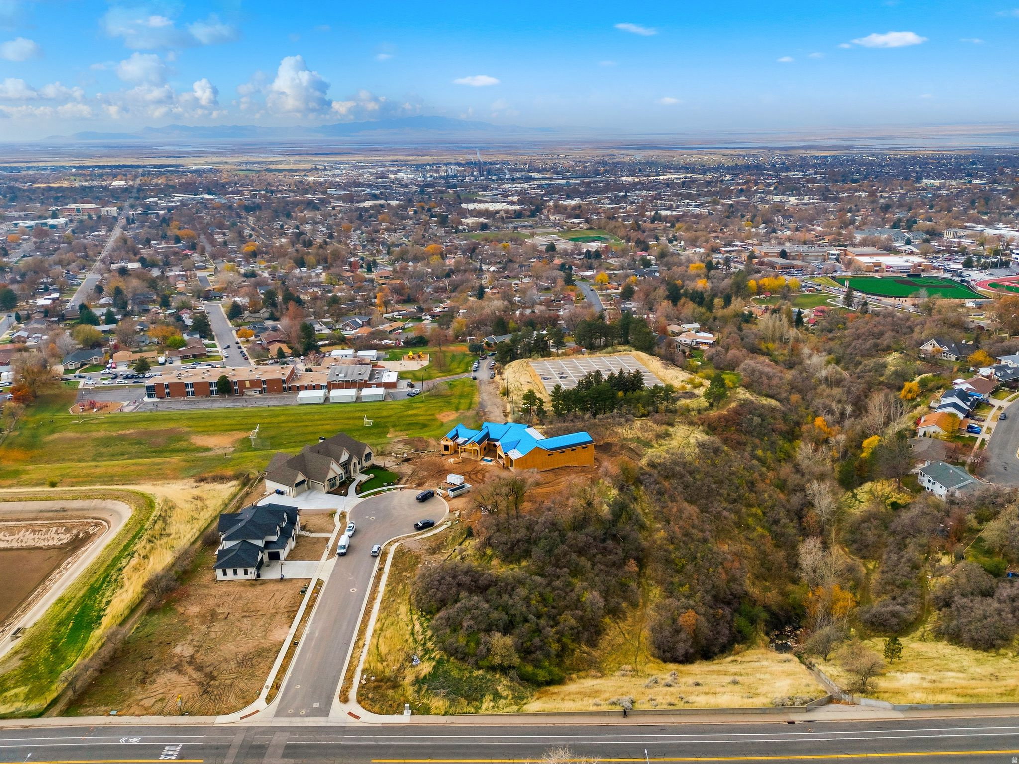 Newly constructed homes on paved roads with established surrounding development