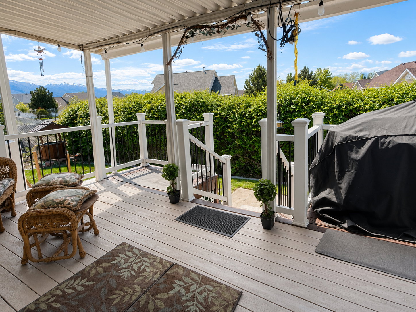 Covered deck with mountain views