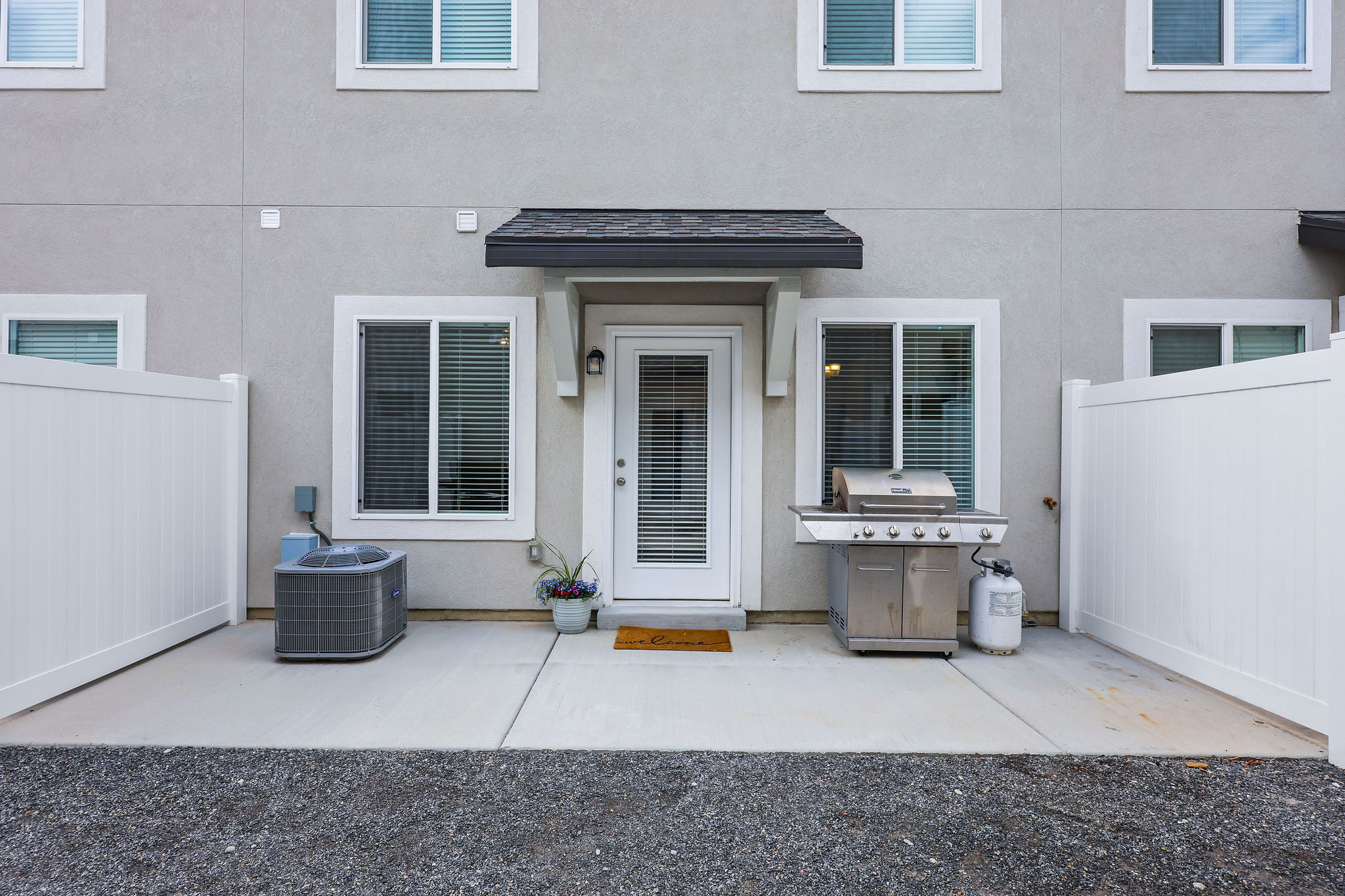 Private patio with durable concrete flooring