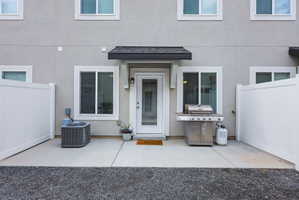 Private patio with durable concrete flooring