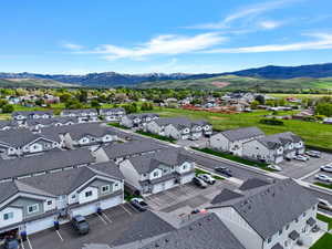 Modern townhome community with pitched roofs and attached garages
