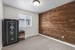 Accent wall featuring varied-width wood planking
