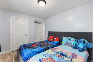 Interior room with light blue walls and wood-finish flooring
