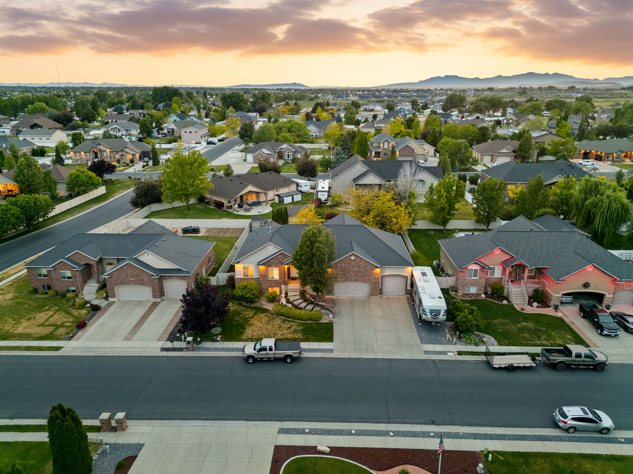 Suburban neighborhood featuring varied architectural styles and mature landscaping