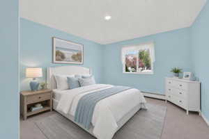 Virtual staging included to showcase room potential. Bedroom featuring light blue walls and neutral carpeting