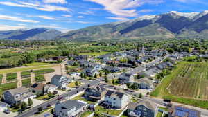 Residential neighborhood featuring single-family homes with mountain backdrops