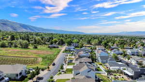 Expansive neighborhood featuring residential properties and tree-lined streets
