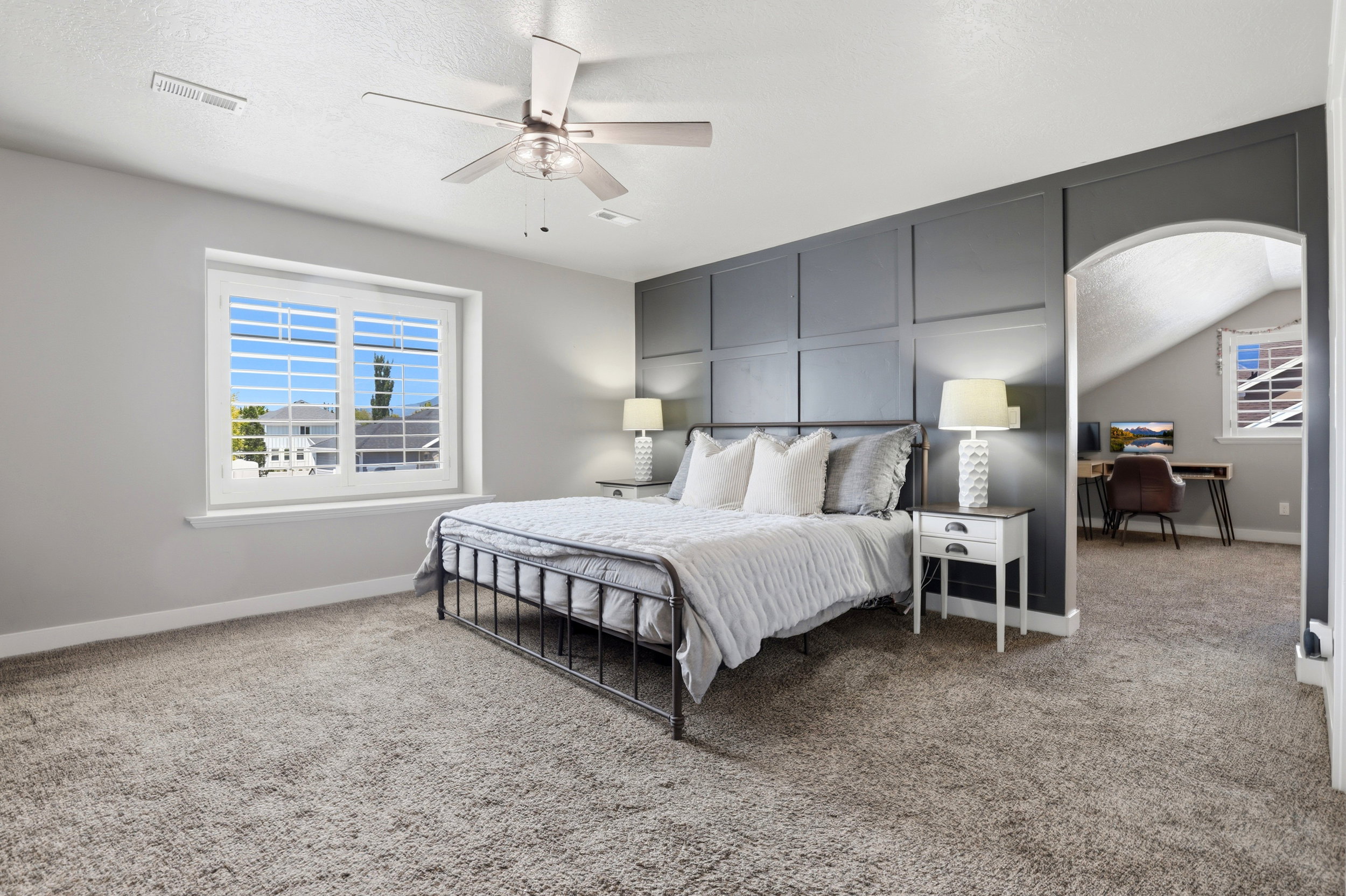 Spacious room featuring neutral carpet and light gray walls