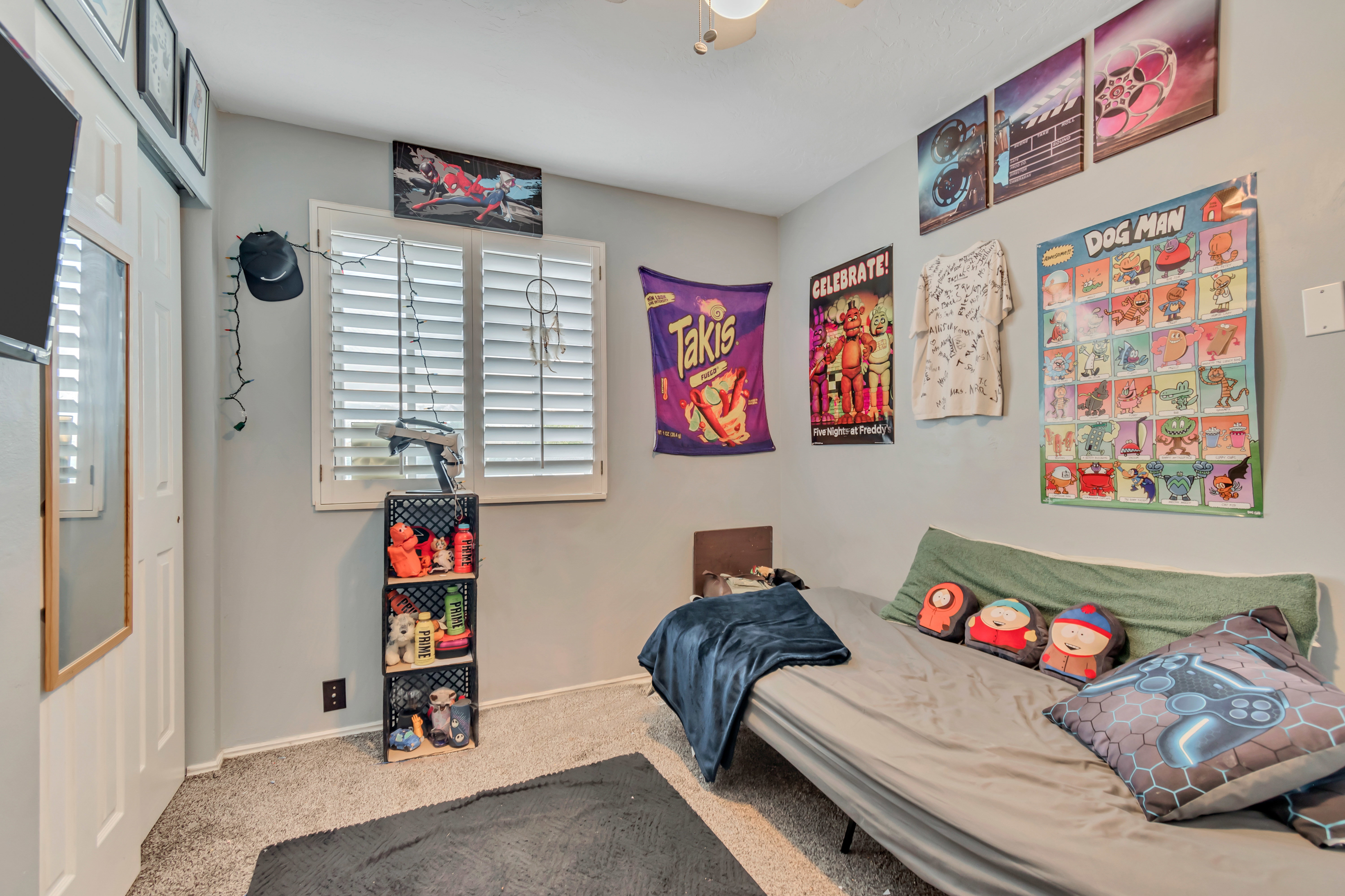 Room featuring light gray walls and carpeted flooring
