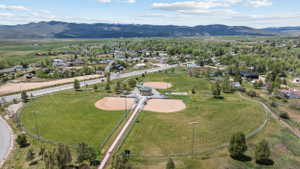 Expansive community sports complex featuring multiple baseball fields with manicured outfields and infields
