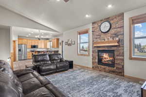 Stone-faced fireplace with a wood mantel