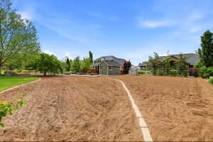 Expansive cleared lot offering significant potential for outdoor development