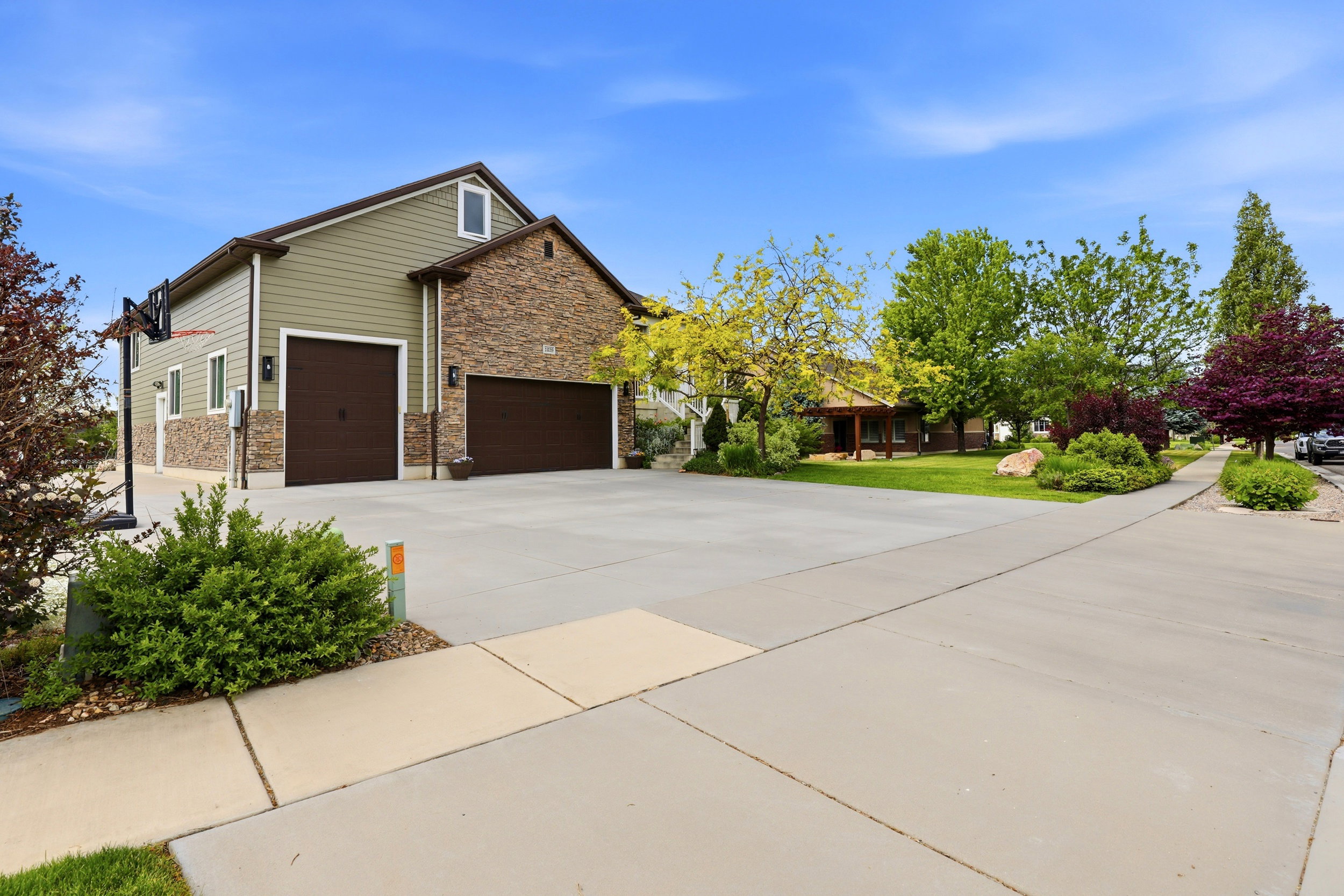 Contemporary exterior featuring horizontal siding and stone accents