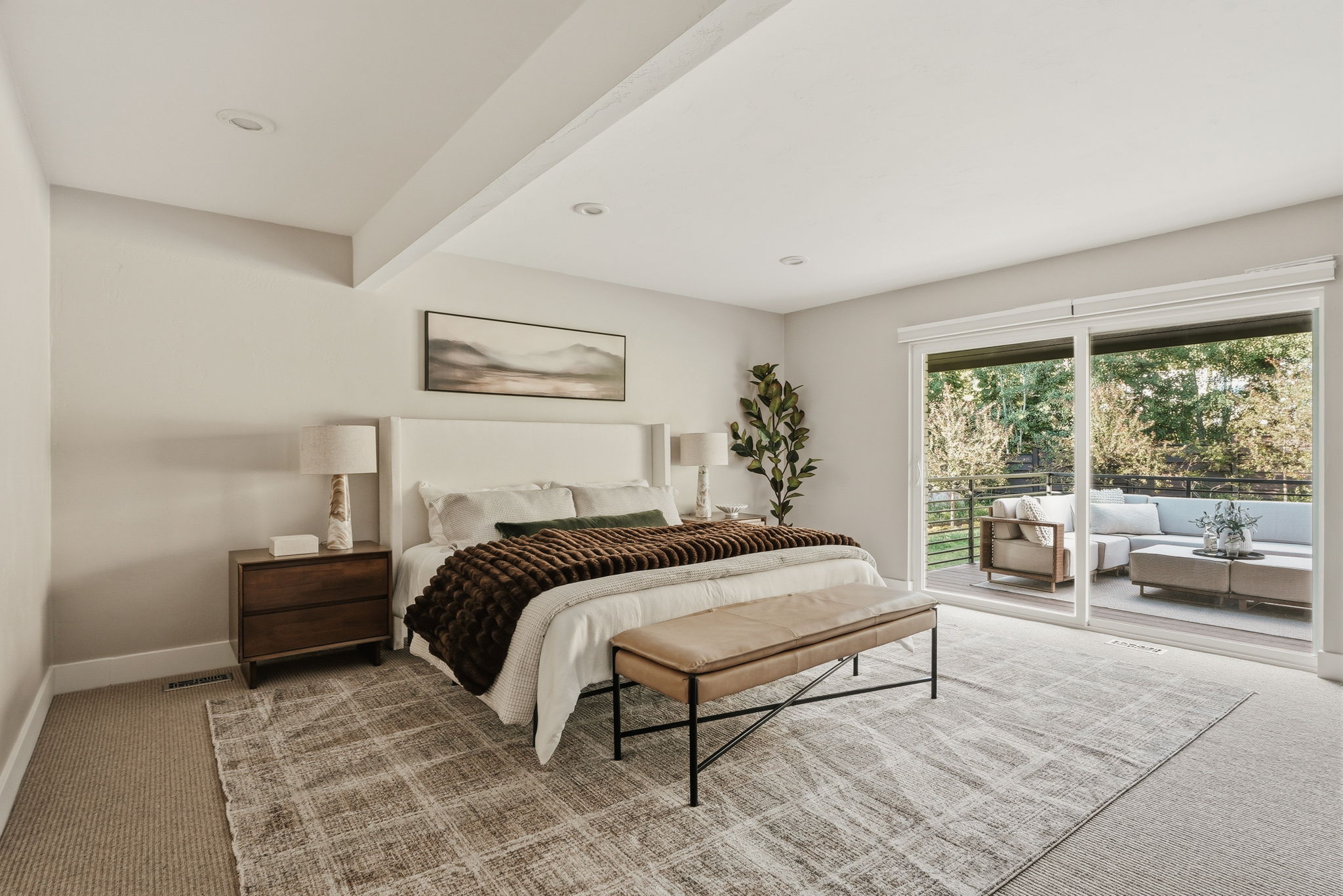 Spacious room featuring recessed lighting and a wide sliding glass door