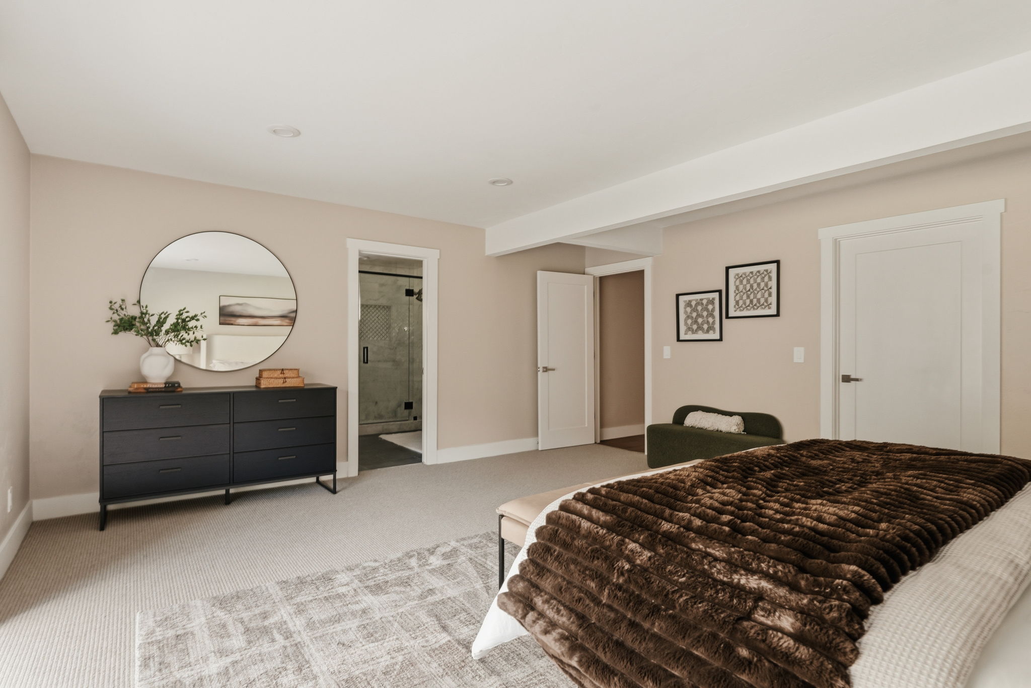 Neutral-toned bedroom featuring recessed lighting and light tan wall color