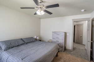Neutral wall tones with a ceiling fan featuring integrated lighting