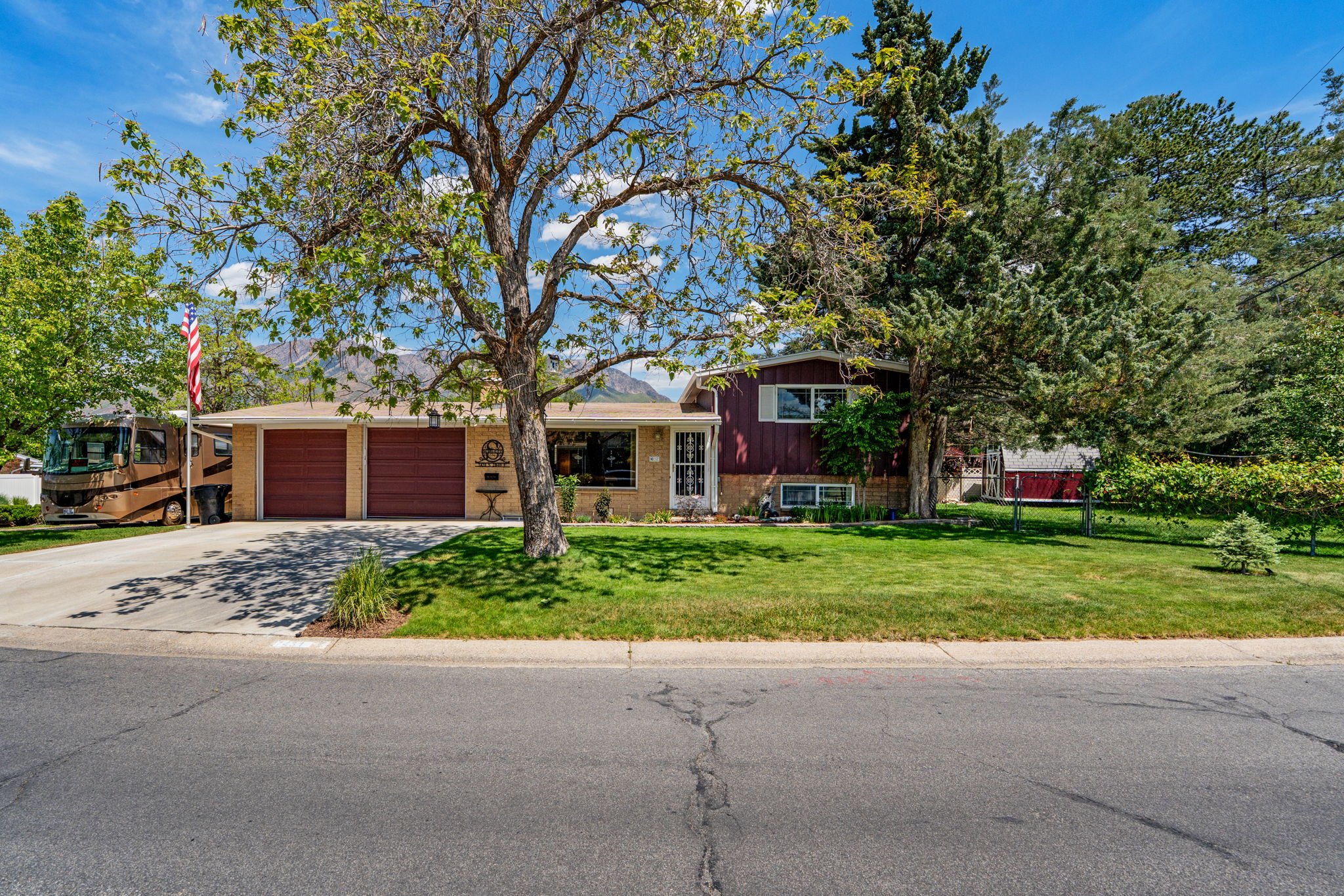 Cottonwood Heights Neighborhood! Mountain Views! Corner Lot! Mature Trees. RV Parking. Private Yard.