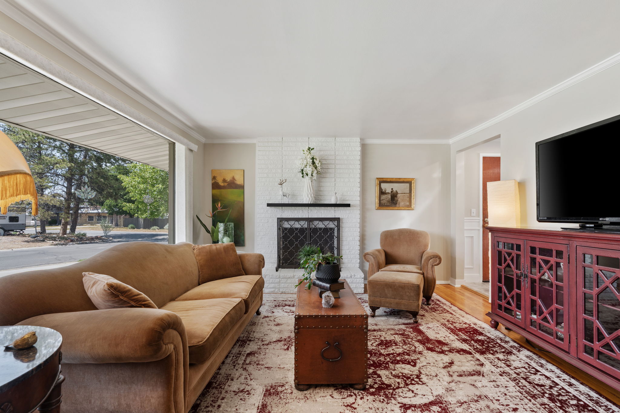 Front Living Room! Fire Place. Expansive Window. Original Hardwood Flooring!