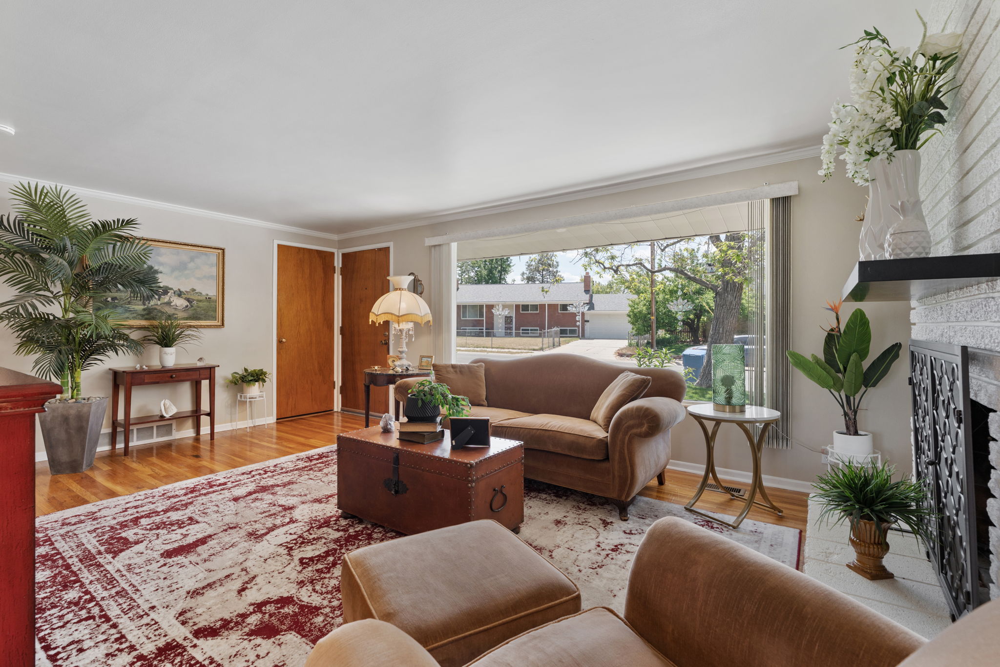 Front Living Room! Fire Place. Expansive Window. Original Hardwood Flooring!