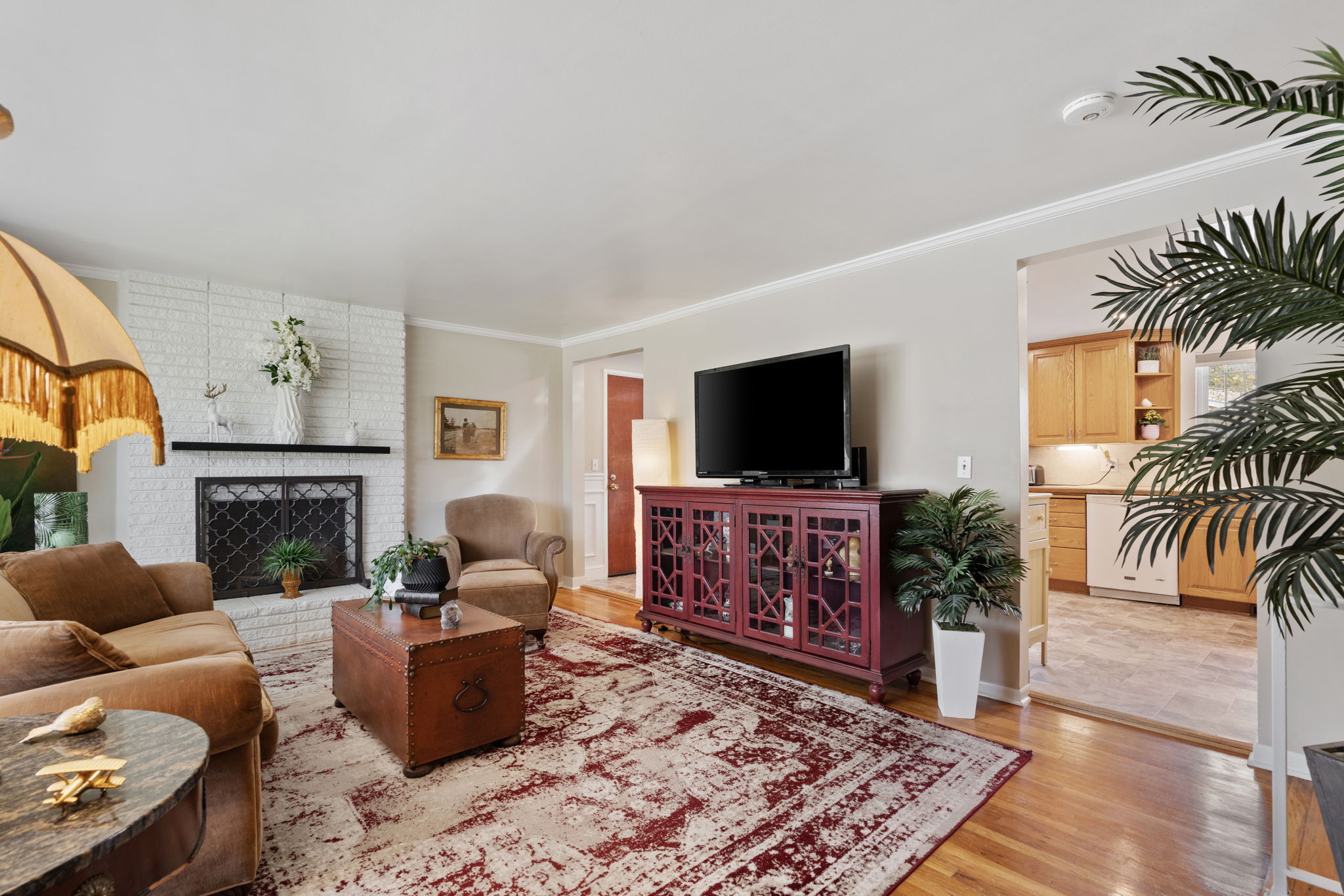 Front Living Room! Fire Place. Expansive Window. Original Hardwood Flooring!