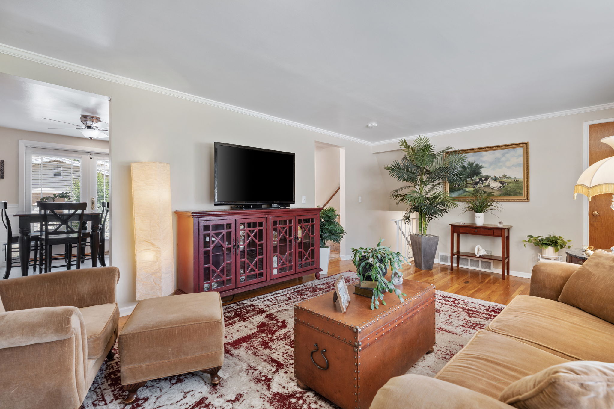Front Living Room! Fire Place. Expansive Window. Original Hardwood Flooring!