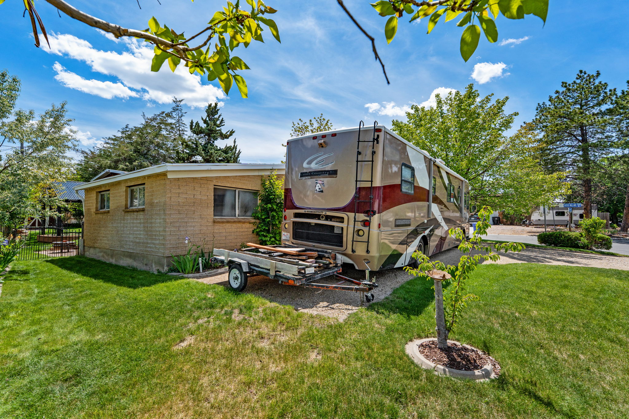 RV Parking. 6"of gravel base. (2) electric hookups, a 30 amp, and a 50 amp. Access to sewer cleanout!