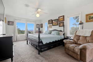Bright interior featuring neutral-toned carpet flooring and white walls