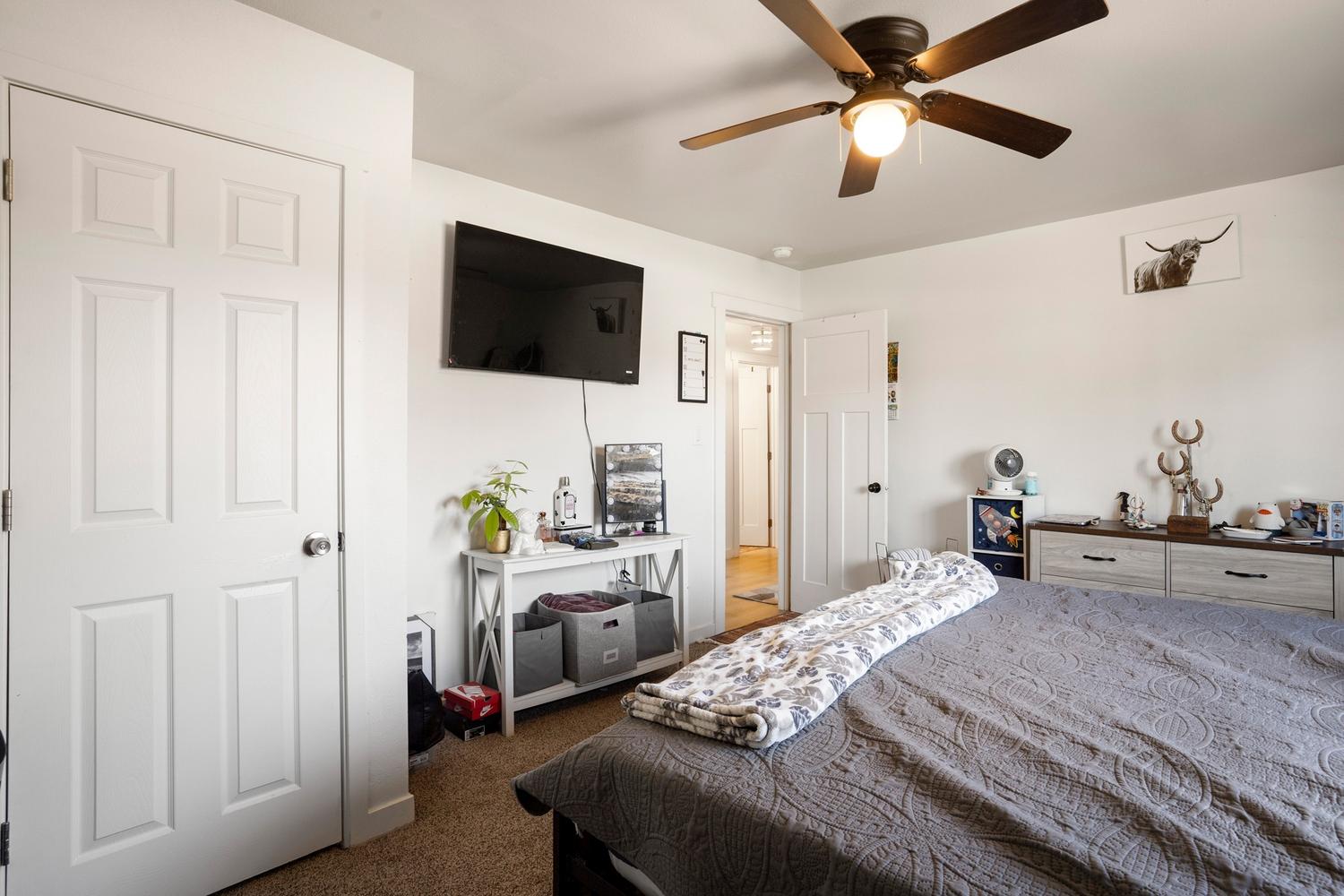 Interior room featuring carpet flooring and white walls