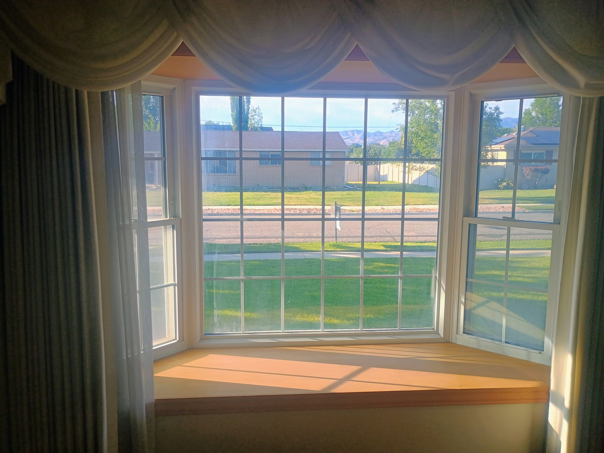 Bay window featuring a built-in wood-finish window seat